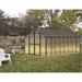 garden setting of the 16ft black monticello premium greenhouse 