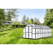 garden setting view of the 20ft black monticello growers greenhouse 