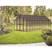 garden setting of the 20ft black monticello premium greenhouse 