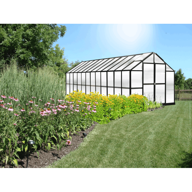 garden setting view of the 24ft black mont greenhouse growers edition