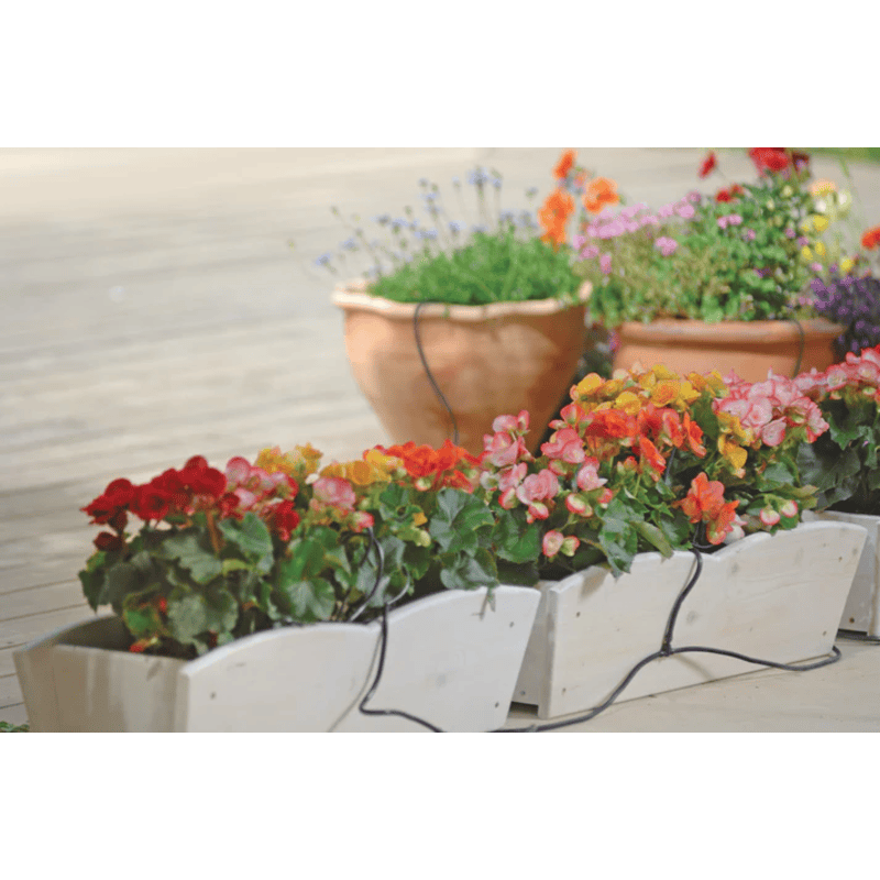 view of the Genesis dripper watering kit being used in the garden