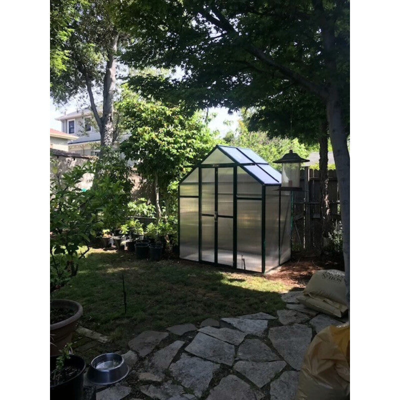 Grandio Element 6×4 Greenhouse placed in a garden setting