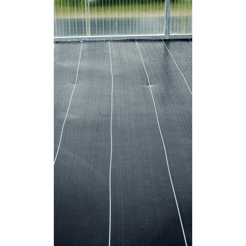 Close Up Image of RSI Commercial All Weather Landscaping Ground Covering Showing 12 Inch Apart Lines
