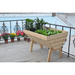 white background image of RSI Eden deep root V-shaped garden table with plants growing in it