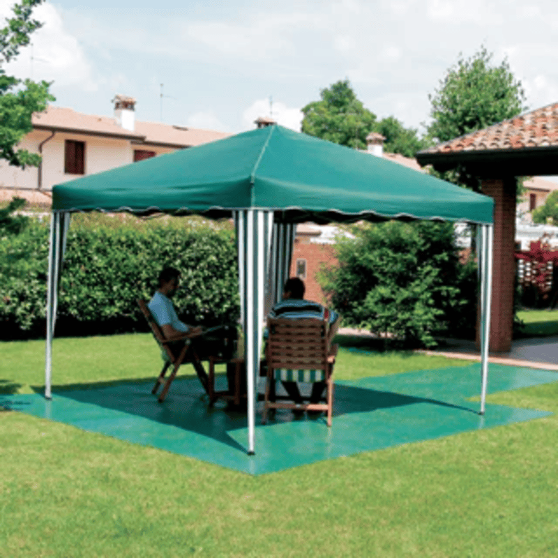 Two people sitting under a green outdoor canopy in a garden setting.