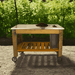 outside garden view of the lee display gardener's pro potting table 