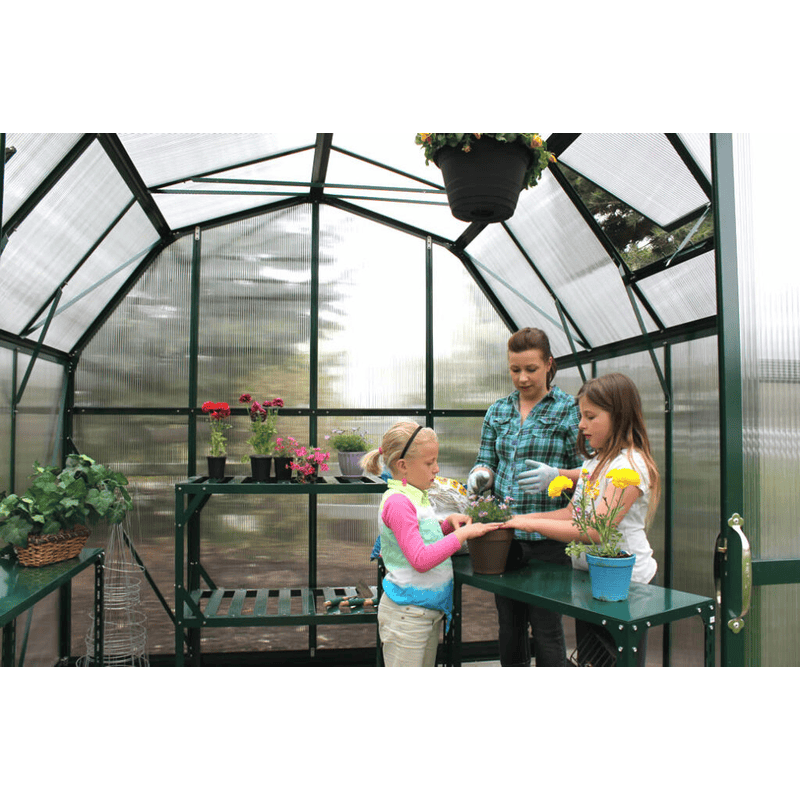 woman and children inside of the grandio elite 8×16 greenhouse