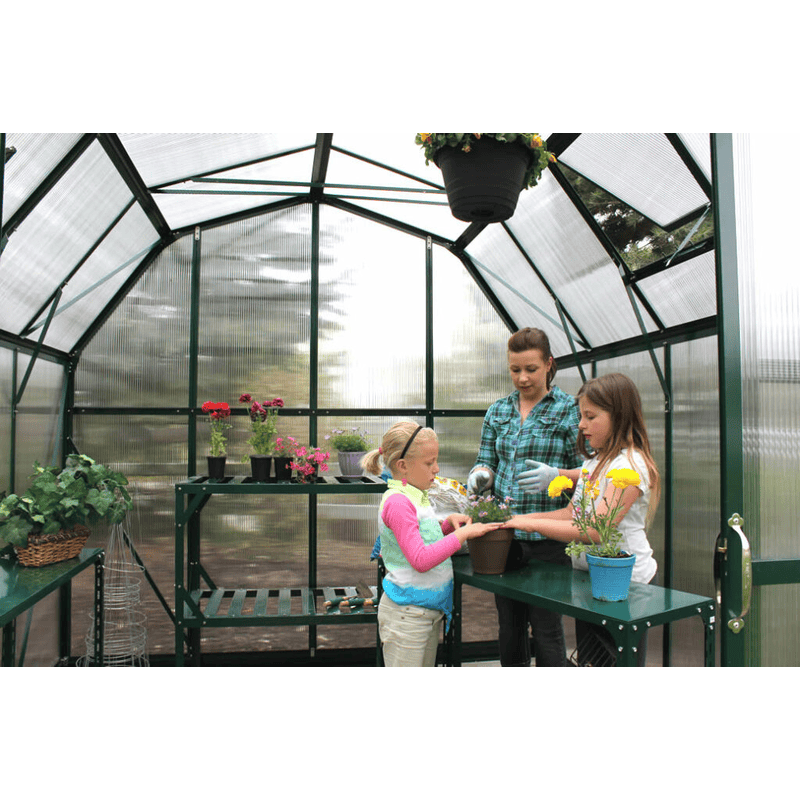 woman and kids working inside the grandio elite 8×20 greenhouse