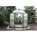 woman working inside of the grandio elite 8×20 greenhouse