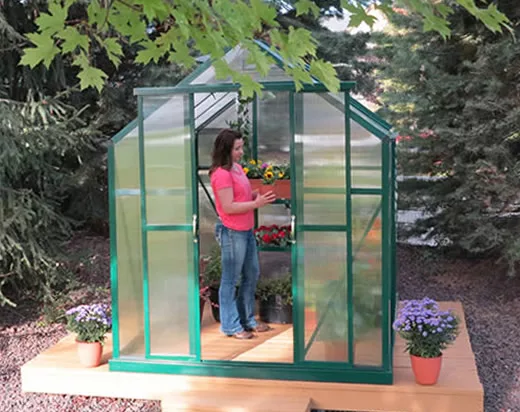 woman working inside the grandio greenhouse element 6×4
