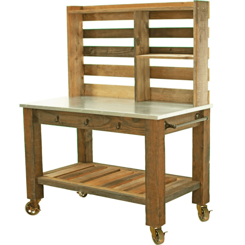 side view of the lee display redwood potting table with tool hooks and towel bar