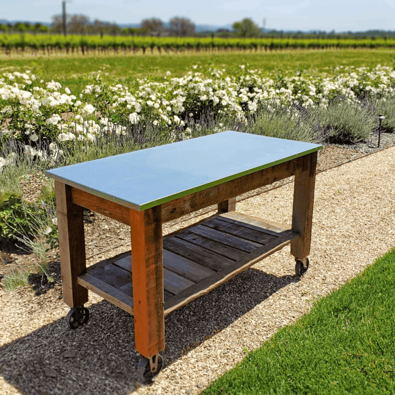 outside garden view of the lee display redwood potting table rolling cart