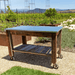 outside front view of the lee display redwood potting table rolling cart