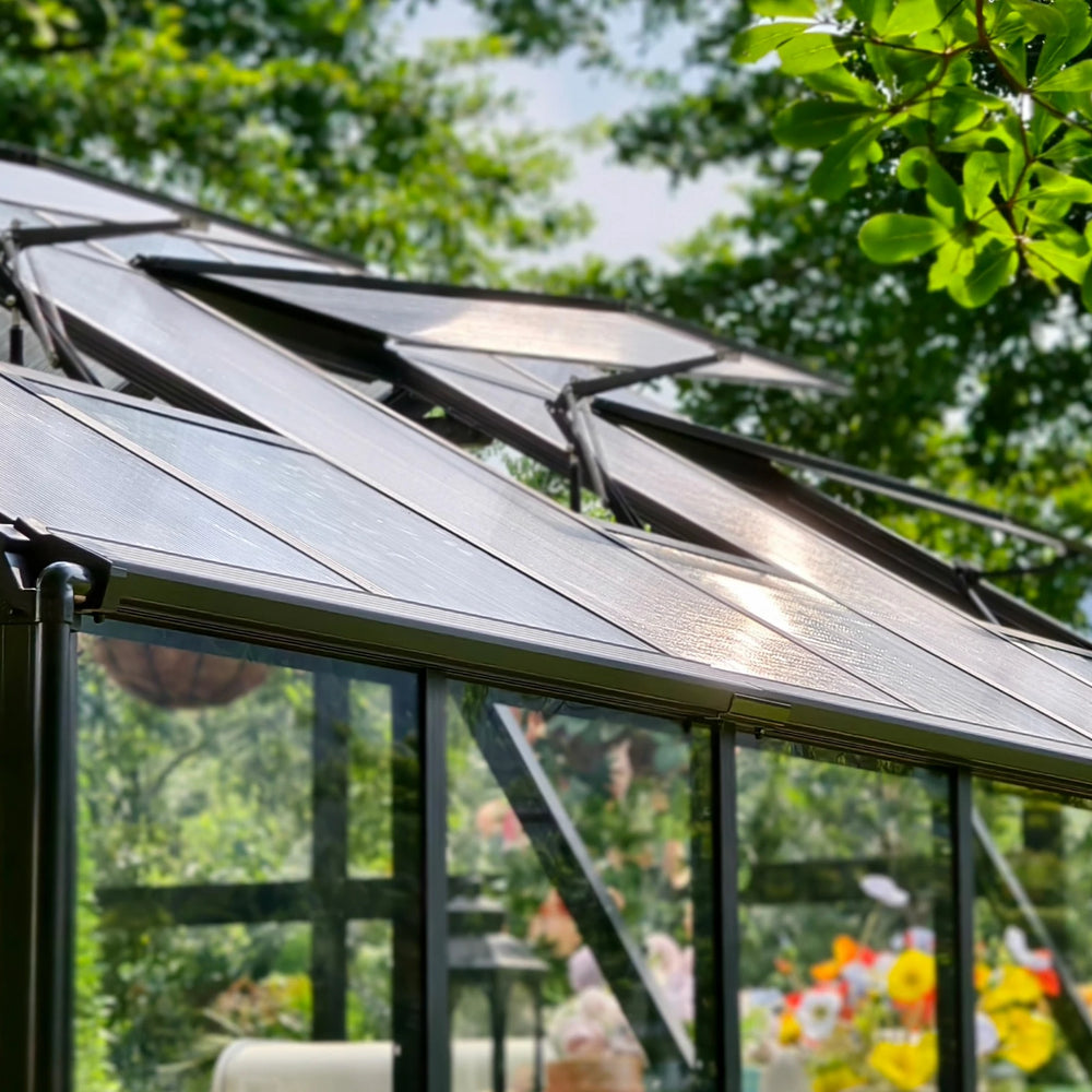 Close-up of open roof ventilation windows and polycarbonate roof panels on the Vego Garden Victorian Greenhouse