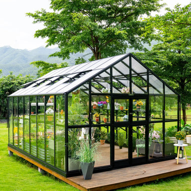 Vego Grand Victorian 12.5ft greenhouse with glass walls, black frame and open roof vents, photographed from the front corner