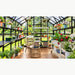 Illustrative Victorian-style greenhouse interior with planting benches, potted flowers and a wicker seating area